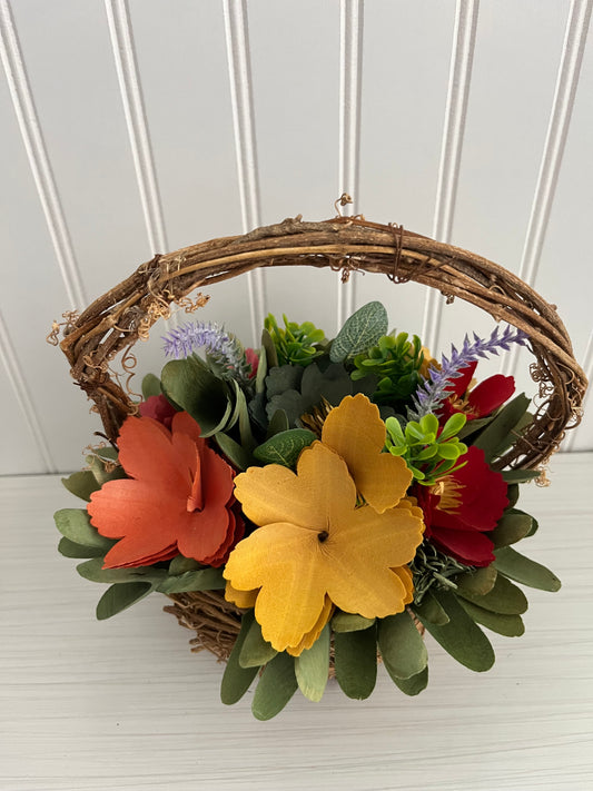 Modern Handcrafted Multicolor Flower Arrangement With Natural Wood Elements in Rustic Woven Basket - 9” Tall